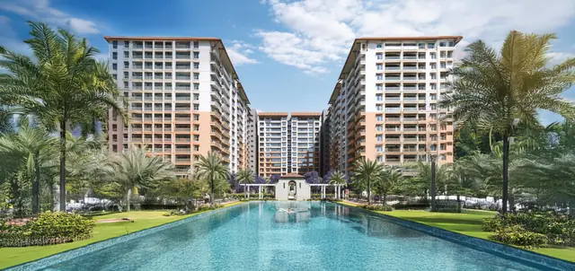 Lap pool framed by towers